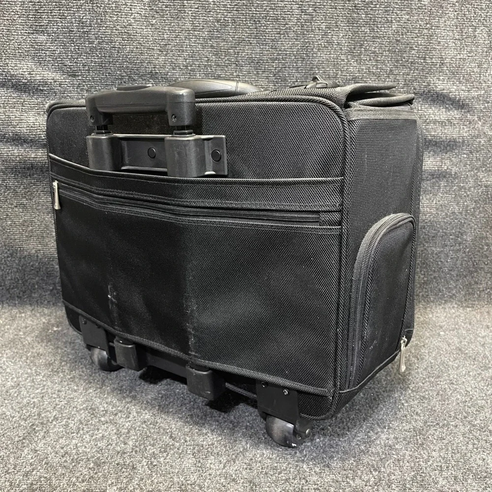 US Luggage New York Black Ballistic Nylon Rolling Catalog Case Wheeled Briefcase